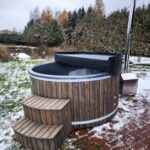 Anthracite pearl fiberglass hot tub with wood fired heater