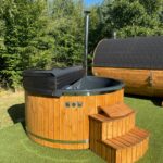 Fiberglass hot tub with external wood fired heater