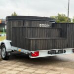 Mobile fiberglass hot tub on trailer platform